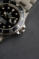 1996 Rolex 16610 - Box and Papers Blue insert