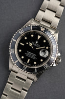 1996 Rolex 16610 - Box and Papers Blue insert