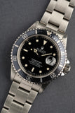 1996 Rolex 16610 - Box and Papers Blue insert
